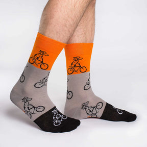 Good Luck Sock - Orange Dog Riding Bike